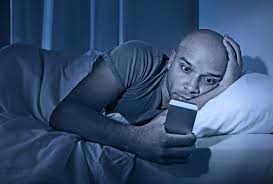 using phone in bed