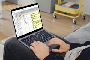 Therapist documenting progress toward treatment plan