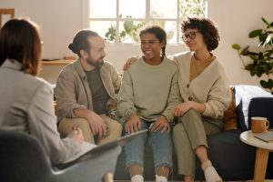 A social worker providing case management services to a family.