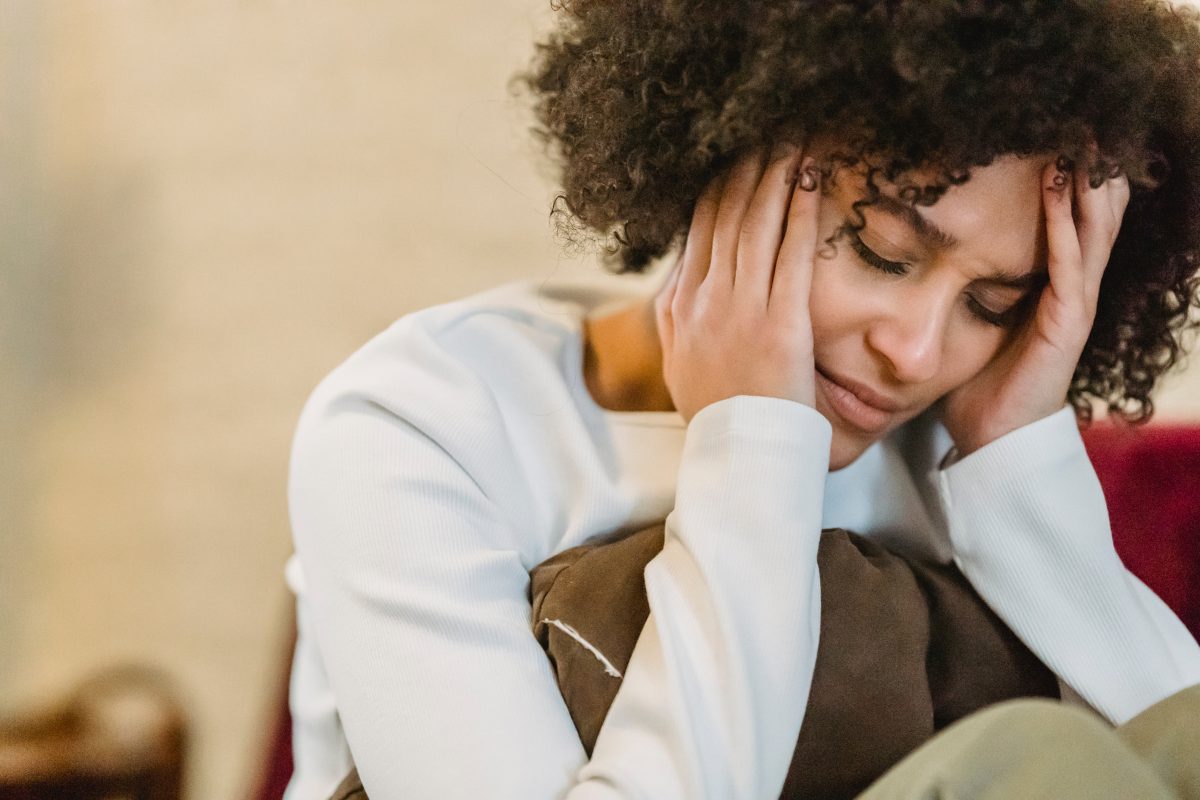 A young woman experiencing depressive symptoms