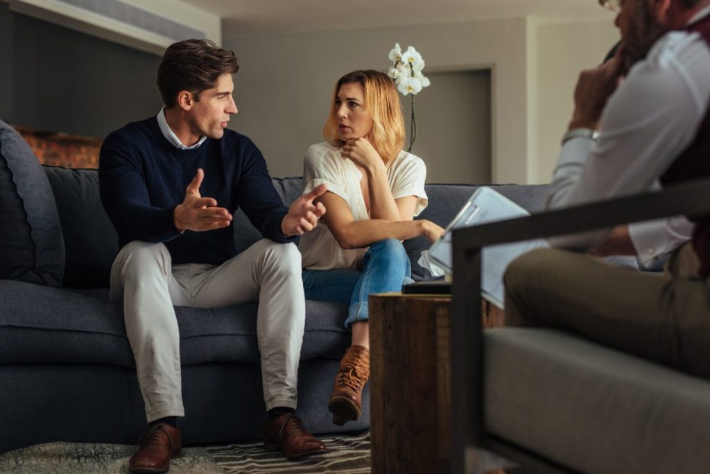 A couple in therapy with a counselor