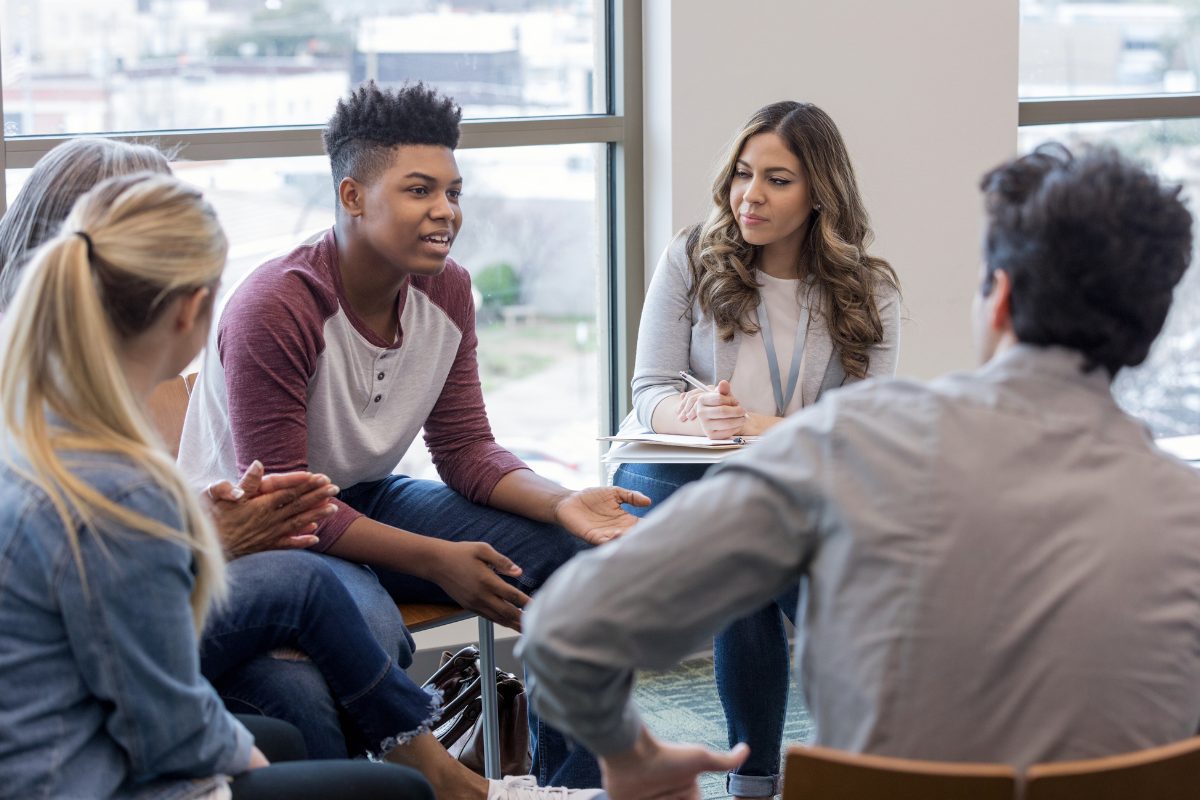 Conflict Resolution in Group Therapy Navigating Disagreements Constructively - 1200x800 Group therapy participants navigating conflict resolution